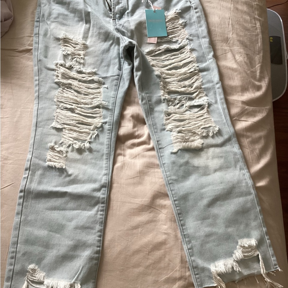 Distressed Light Blue Jeans